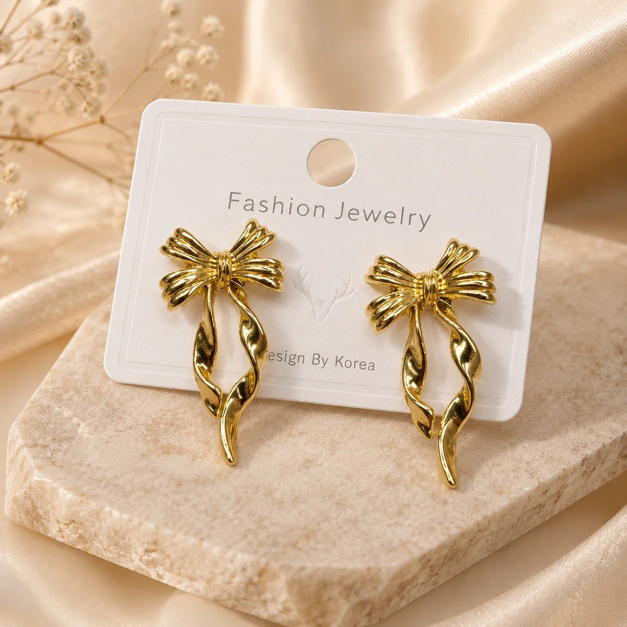 The Korean Sculpted Gold Ribbon Drops