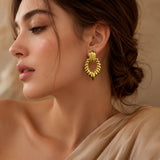 The Gen'z Ribbed Gold Statement Earrings